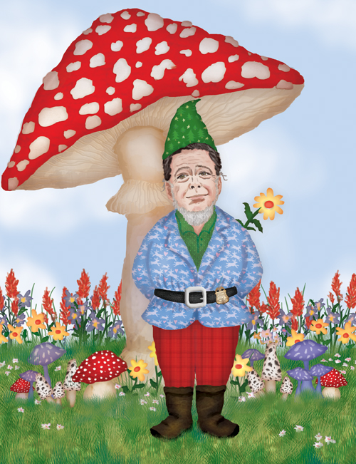 Former FBI Director Jim Comey is dressed as a gnome and is standing underneath a giant mushroom.